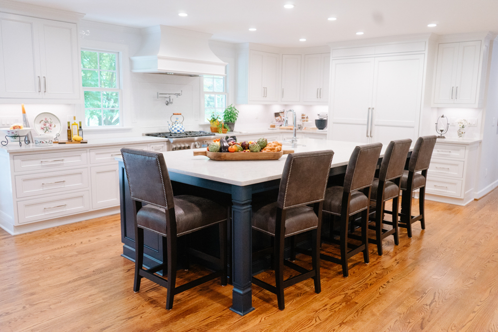 Remodeled kitchen with a large island by TrendMark
